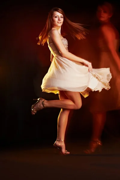 Beautiful young female dancing — Stock Photo, Image