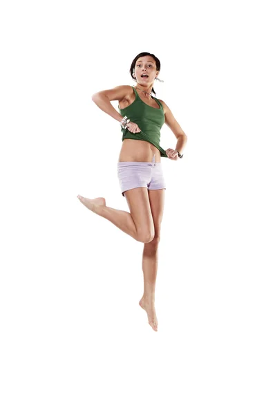 Jovem mulher emocional pulando, isolado em branco — Fotografia de Stock