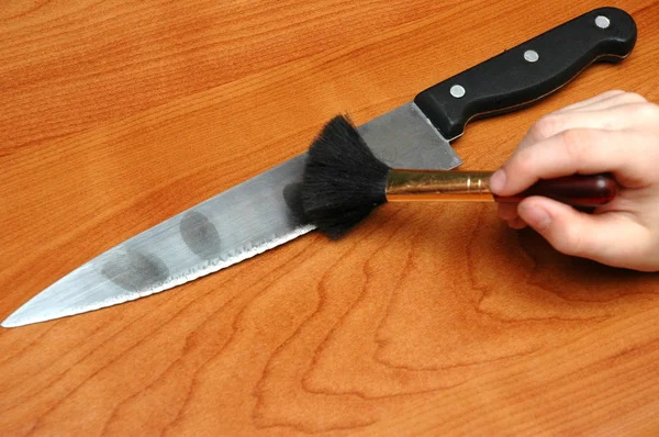 Отпечатки пальцев на ноже — стоковое фото