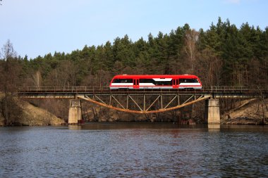 Railbus on the bridge clipart