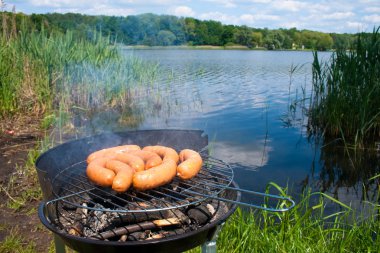 Grilling at summer weekend clipart