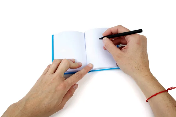 Handschrift auf einem kleinen Notizbuch — Stockfoto