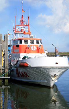 SAR boat on the port. North Sea. clipart