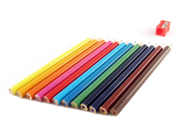 Lápis coloridos e apontador de lápis — Fotografia de Stock
