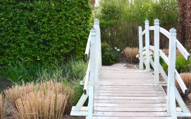 Footbridge in the garden clipart