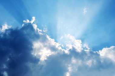 Summer sky with sun-rays clipart