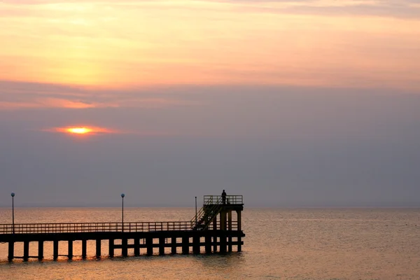 Pier at sunset — Stock Photo, Image