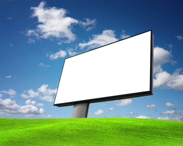 Empty billboard on green field — Stock Photo, Image