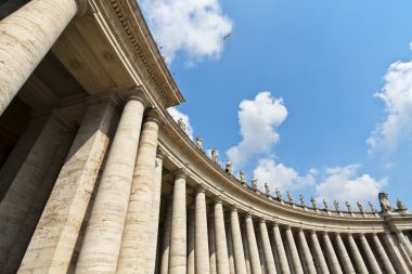 Famous colonnade of St. Peter's Basilica in Vatican clipart