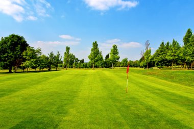 Golf course and blue sky clipart
