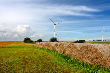 Straw bales and wind turbines clipart