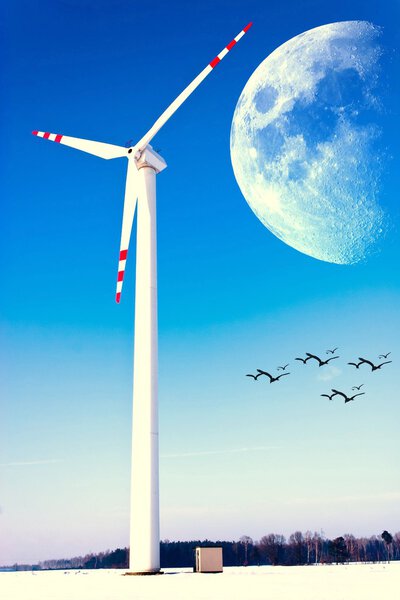 Wind turbines on green field. Alternative source of energy