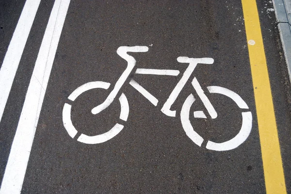 stock image Drawing of a contour of a bicycle on asphalt