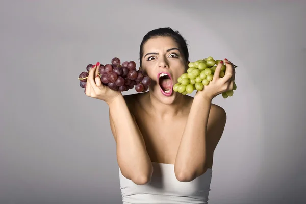 Woman with mix of grapes — Stock Photo, Image