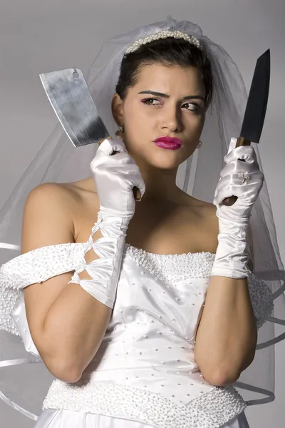 Bridezilla hält Messer in der Hand Stockfoto