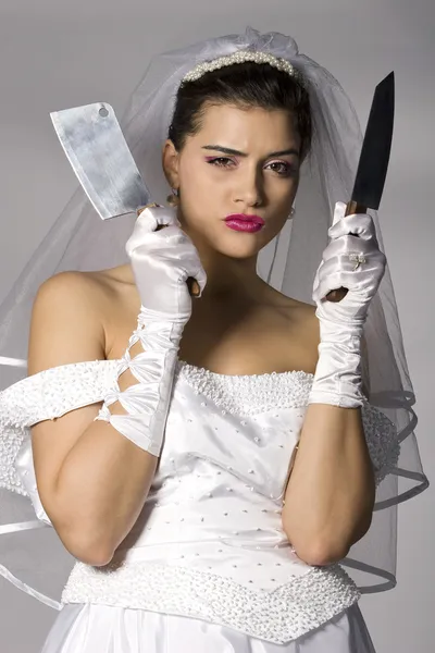Bridezilla in possesso di coltelli Fotografia Stock