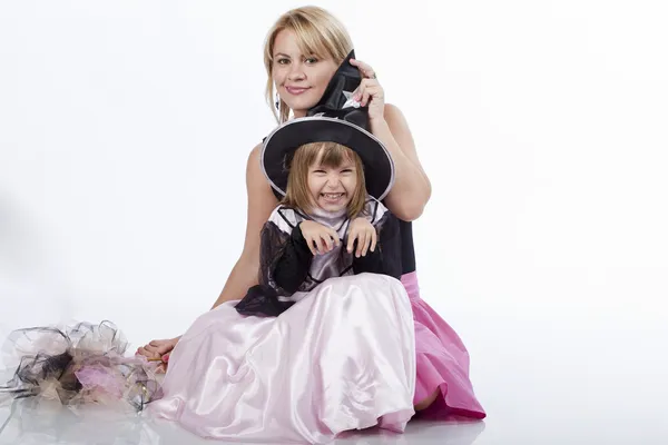 Mother and daughter having fun at Halloween party — Stock Photo, Image