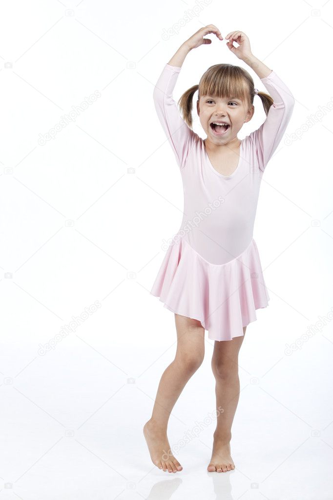 Joyful little girl wearing ballerina outfit