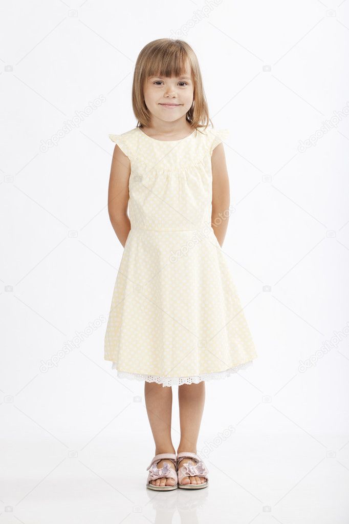 Full lenght portrait of an adorable 5 years old girl