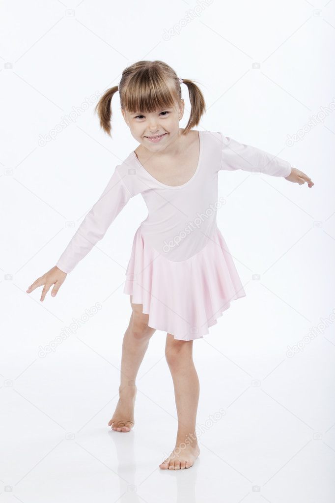 Happy little ballerina dancing