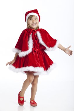 5 years old girl is happy to be Santa's little helper clipart