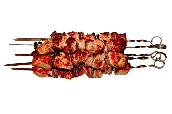 Varkensvlees kebab op wit bord — Stockfoto