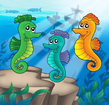 Sea horses family with shipwreck clipart