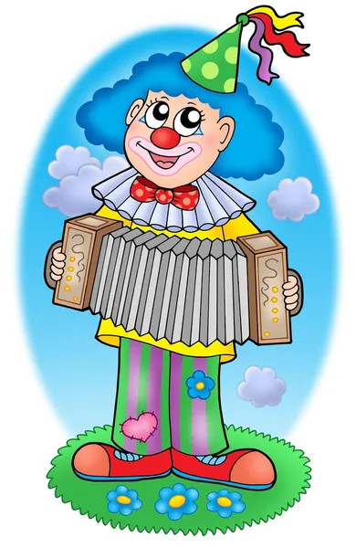Клоун с аккордеоном на лугу — стоковое фото