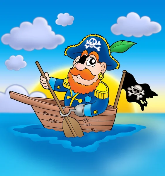Пират на лодке с закатом — стоковое фото