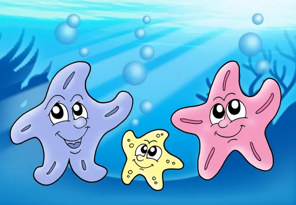 Starfish family playing with bubbles — Stock Photo, Image