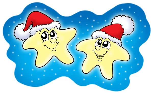 Stars in Christmas caps on blue sky — Stock Photo, Image