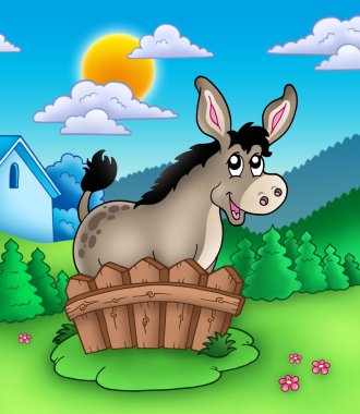 Cute donkey behind fence clipart