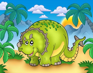 Cartoon triceratops in landscape clipart