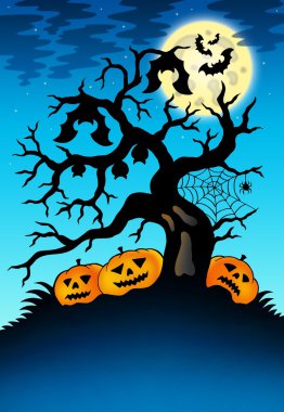 Spooky tree with bats and pumpkins clipart