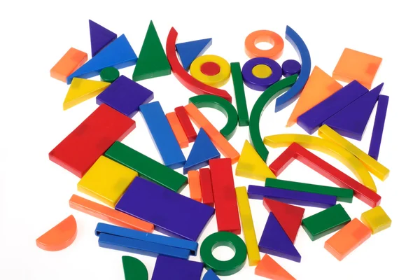Plastic blocks geometrical figures — Stock Photo, Image