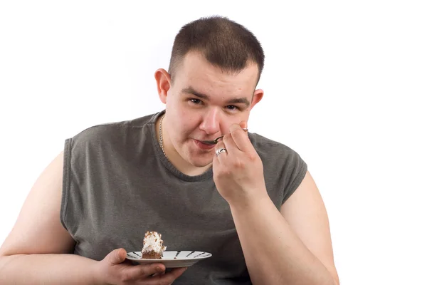 Άνθρωπος τρώει τούρτα — Φωτογραφία Αρχείου