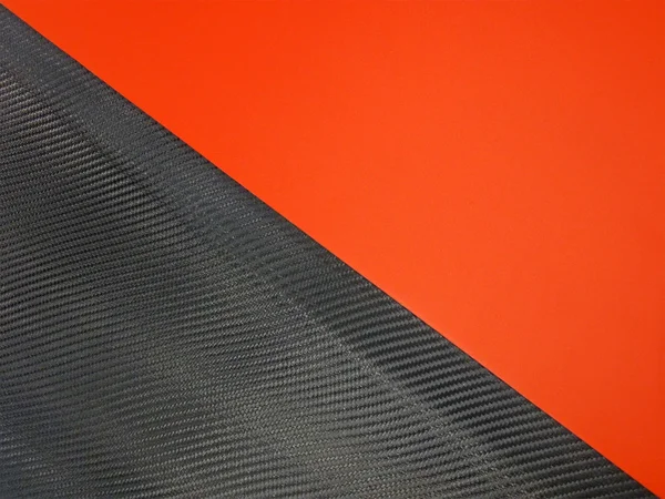 Textura de plástico preto, vermelho ziguezague — Fotografia de Stock