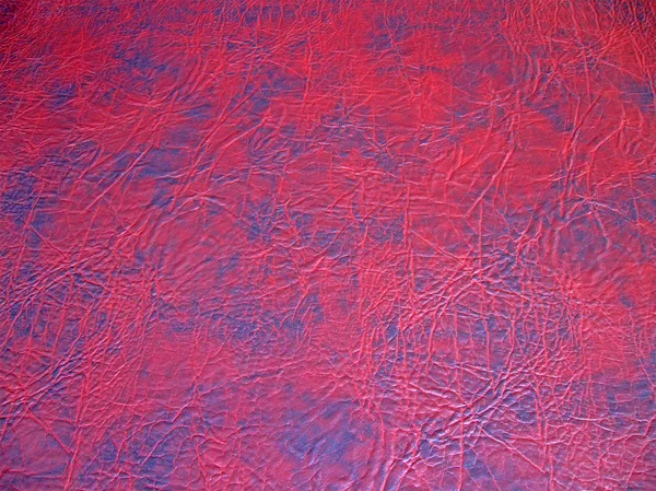 Textura de couro vermelho, detalhes de material de close-up — Fotografia de Stock