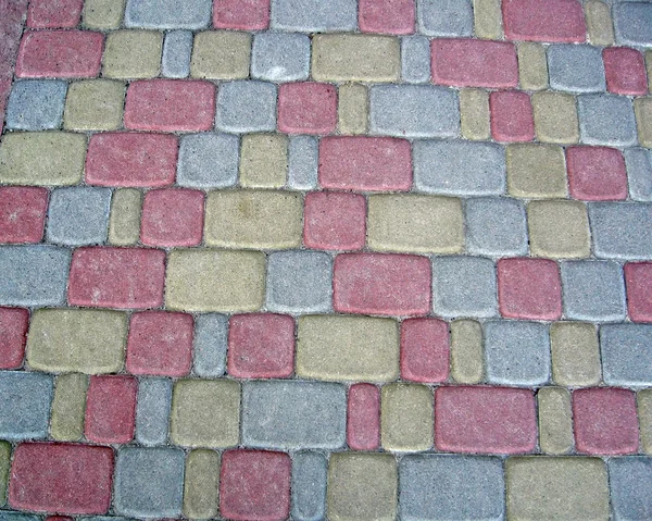 Renkli taşlar yığını, renkli sokak dokusu — Stok fotoğraf