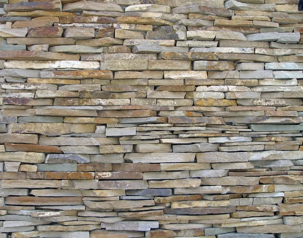Piedra pared de la pila, detalles de fondo de construcción —  Fotos de Stock