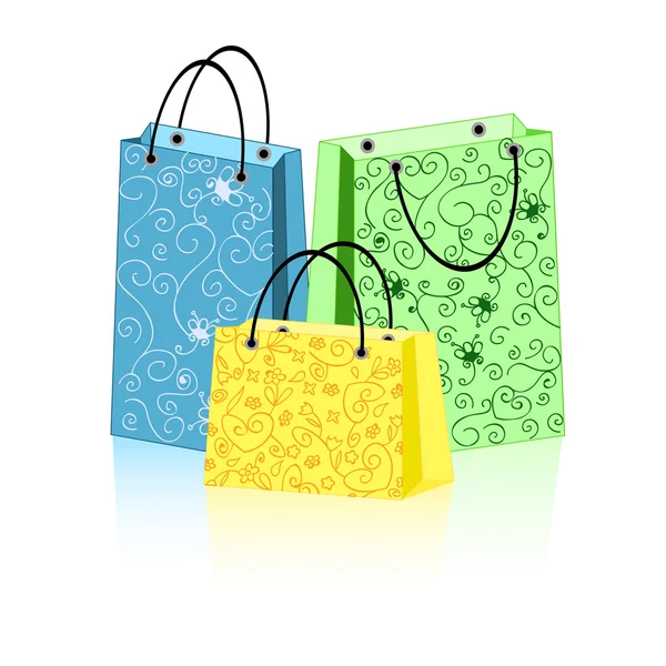 Shopping tassen met ornament — Stockvector