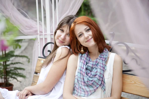 Portrait of two girls at outdoor. — Stock Photo, Image