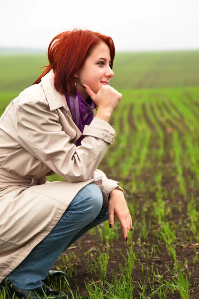 Girl at spring field — Stock Photo, Image