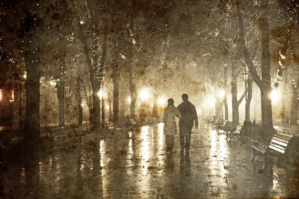 Çift, gece ışıkları sokakta yürürken. Fotoğraf eski görüntü stili. — Stok fotoğraf