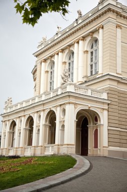 Opera-house in Odessa and clouds sky in the background clipart