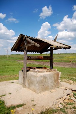 Old well in village clipart