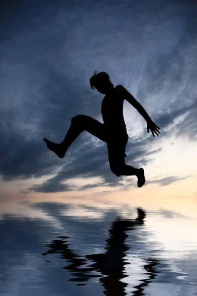 Acrobatic at beach — Stock Photo, Image