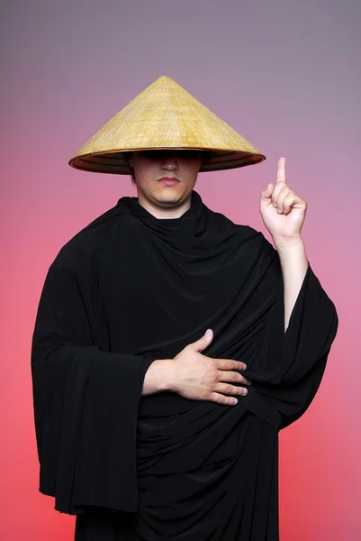 Monk on red background — Stock Photo, Image