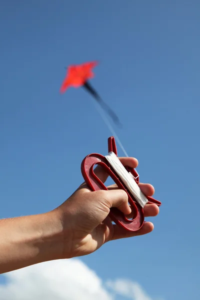 Hand keep fly kite Stock Photo