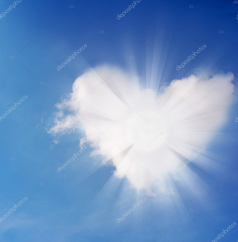 Abstract heart and light in sky.